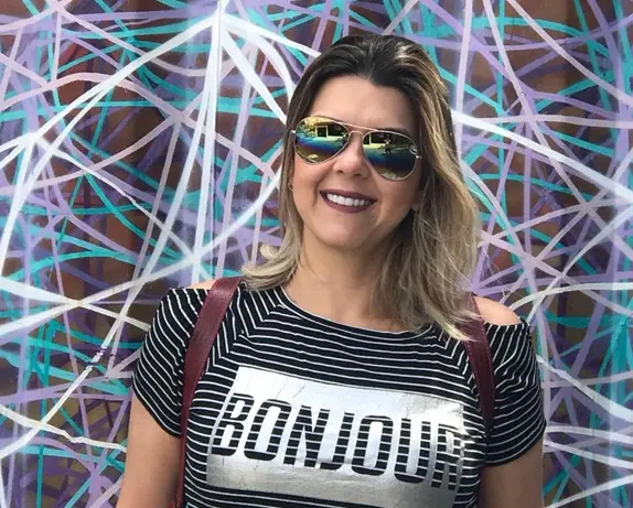 Flávia — inglês, mentoria e a vida de imigrante com Cláudio Habibe